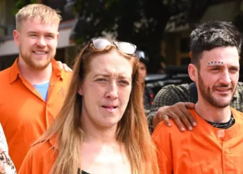 Police escort British nationals LES (center), PAF (left), and JCC (right) in a narcotics case during a press conference at the Bali Regional Police Headquarters in Denpasar, Bali, Friday (February 7, 2025). (ANTARA PHOTO/Fikri Yusuf)