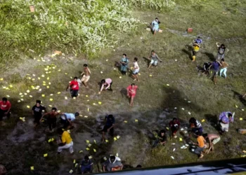 A viral video depicting North Sumatra Governor Muhammad Bobby Afif Nasution, accompanied by military personnel (TNI, or Indonesian National Armed Forces), airdropping food packages