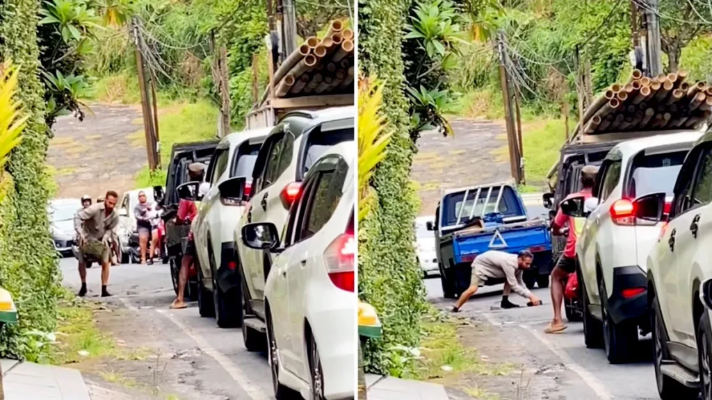 Video: A Tourist's Simple Fix That's Saving Lives in Ubud 2 Screenshot of a foreigner, or tourist, inspired to close a pothole in Ubud for the safety of road users. (Hey Bali)