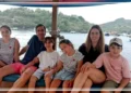 A Moment of Fragile Joy. Fernando Martín Carreras and his family gathered on the deck of the KM Putri Sakinah in Labuan Bajo, captured on the morning of December 26, 2025. This photograph stands as the final portrait of the family together before the tragic events in the Flores Sea later that day.