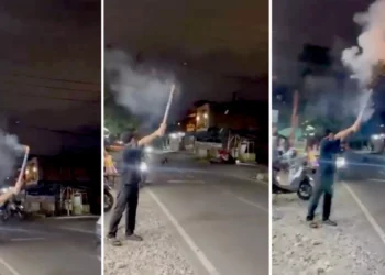 Screenshot of a video of a motorbike accident during New Year's Eve celebrations