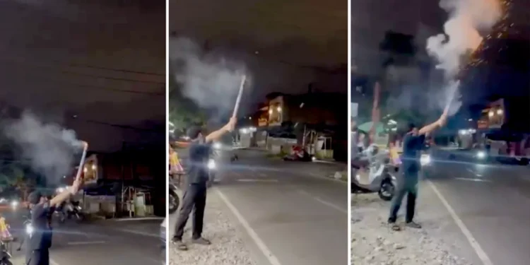 Screenshot of a video of a motorbike accident during New Year's Eve celebrations