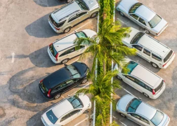 Illustration of a photo of a car parked in a parking lot