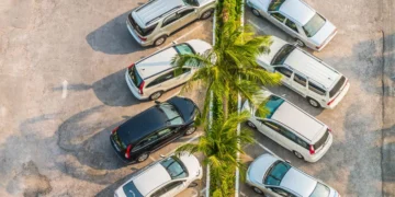 Illustration of a photo of a car parked in a parking lot
