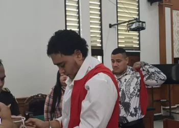 Australian Shooting Trial Delayed as Defendants Cite Inability to Pay for Lawyer 38 Two defendants in the shooting of an Australian citizen after their trial at the Denpasar District Court on Monday (January 12, 2026).