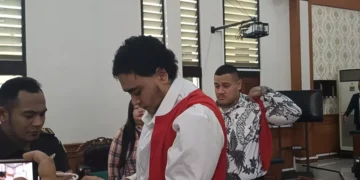 Australian Shooting Trial Delayed as Defendants Cite Inability to Pay for Lawyer 1 Two defendants in the shooting of an Australian citizen after their trial at the Denpasar District Court on Monday (January 12, 2026).