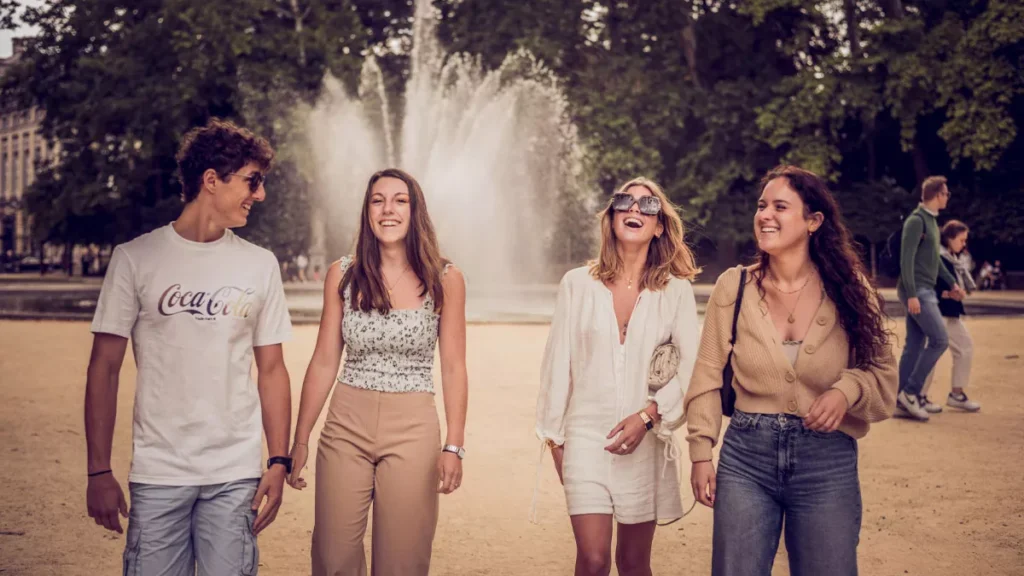 A Group of Friends Walking at the Park while Having Fun (Source: Pexels)