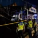 Kuta Police officers set up police tape at a motorcycle rental on Jalan Drupadi, Seminyak Village, Kuta District, Badung Regency, Bali Province, which caught fire early Monday (February 9, 2026). /Doc. Denpasar Police Public Relations (Denpasar Police Public Relations Document)