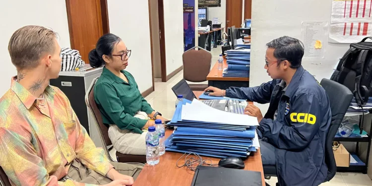 Photo: Luzian Andrin Zgraggen during questioning by Bali Police investigators (IST)