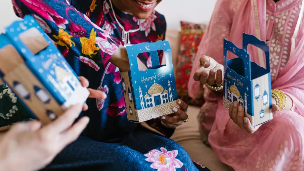 Photo of Three Women Celebrating Eid Mubarak or Eid al-Fitr