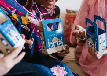 Photo of Three Women Celebrating Eid Mubarak or Eid al-Fitr