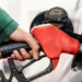 Illustration photo of someone filling up with petrol at a gas station