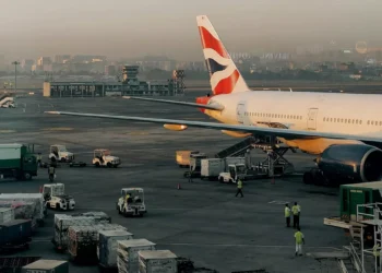 Illustration of an airplane parked at an airport (Pexels)