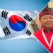 Photo Collage of the South Korean Flag and Bali Governor I Wayan Koster (Ist)
