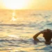 Illustration of a man staring blankly and resignedly in the middle of the sea (Hey Bali)
