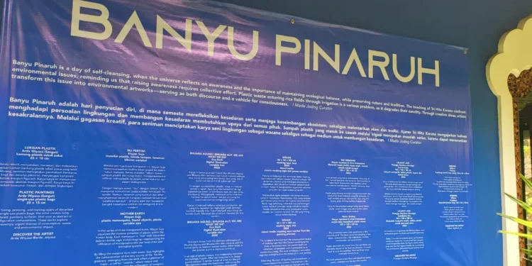 Explanatory photo of the artist's name and artwork exhibited at Junkyard Collective Bali