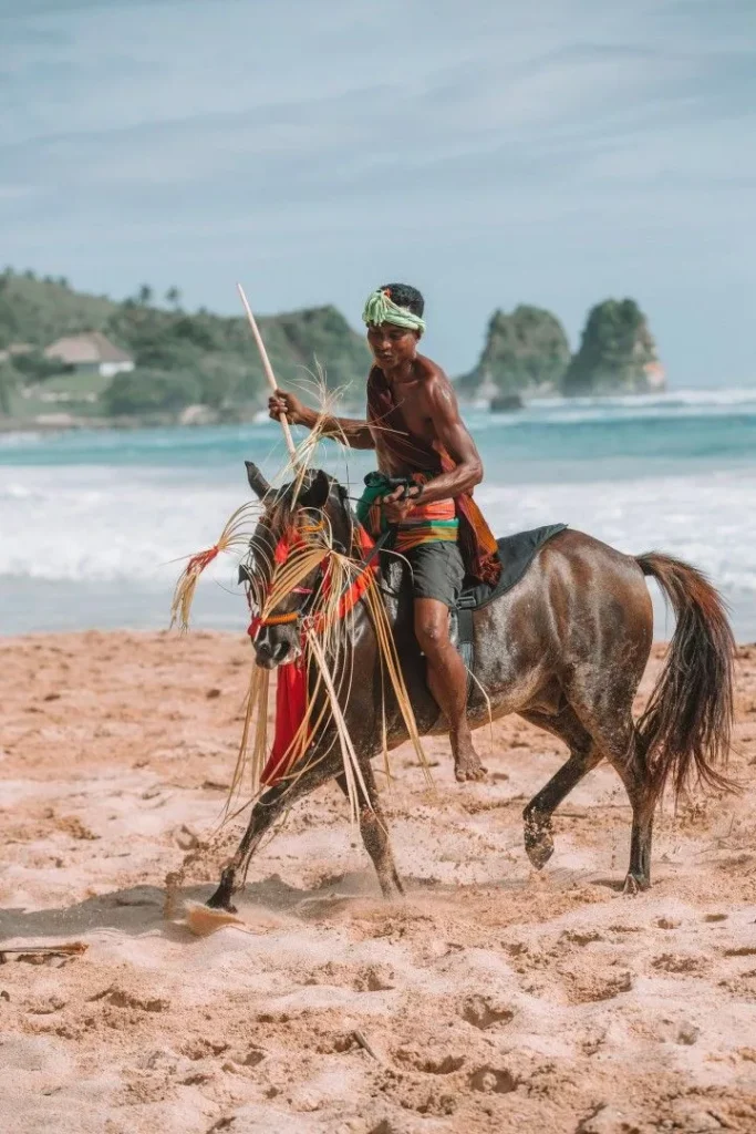 Sumba Tourism: Why Travelers Are Trading Scooters for Horses and Traditional Dress 39
Photo of a native Sumba man on the beach