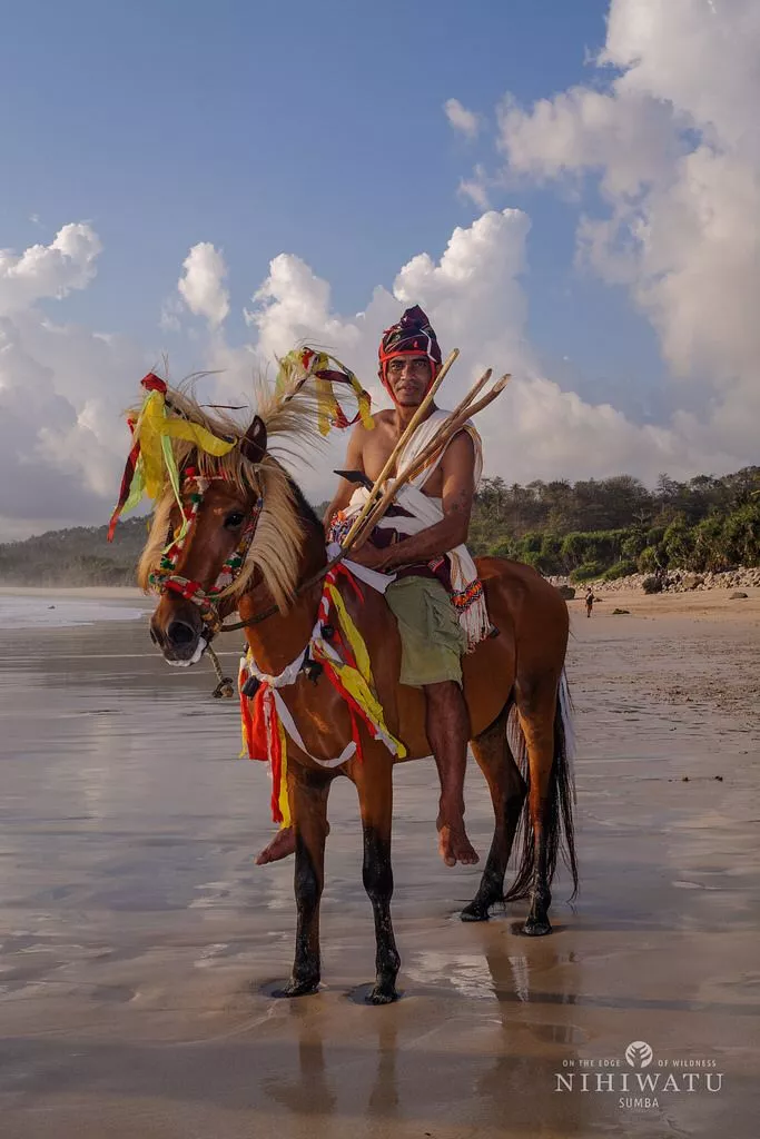 Sumba Tourism: Why Travelers Are Trading Scooters for Horses and Traditional Dress 38
Photo of a native Sumba man on the beach (Doc: Nihiwatu)
