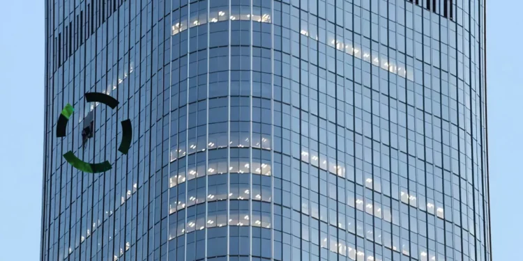 View of the Chinese skyscraper struck by a plane. Photo: REUTERS/Maxim Shemetov