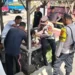 SECURED – Police officers securing a 4-year-old child who had wandered away from parental supervision and was found walking along the Ida Bagus Mantra Bypass in Satra Village on Thursday (June 25, 2026).
