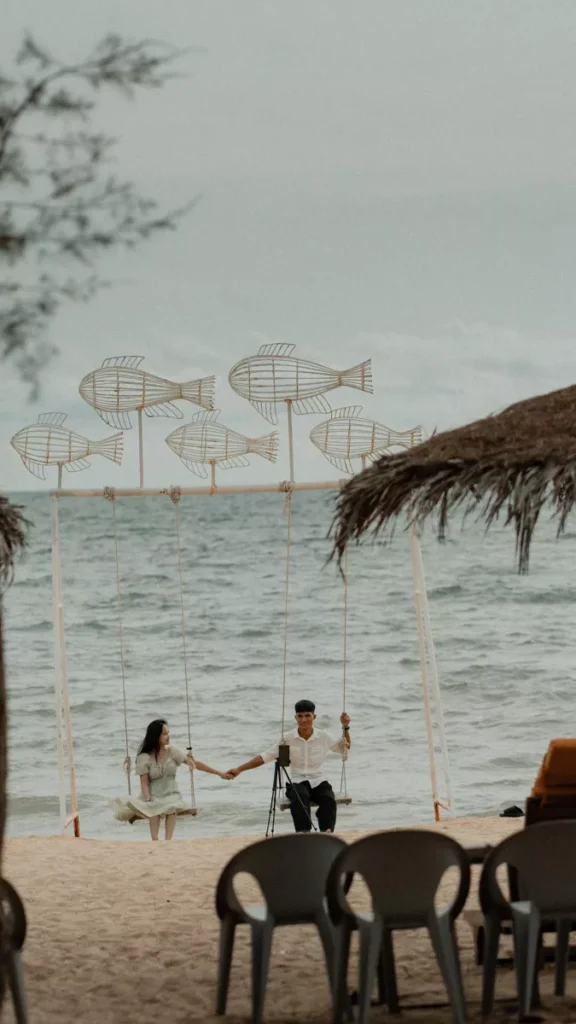 The Island That Just Beat Bali: Why Phu Quoc Is Asia's New Crown Jewel 39
Photo of a couple taking a photo at a corner of the beach in Phu Quoc, Vietnam