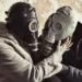 The Most Dangerous Lesson Schools Never Teach: How to Recognize Manipulation 47 Two people wearing gas masks embrace each other, symbolizing emotional manipulation, toxic relationships, and hidden psychological control.
