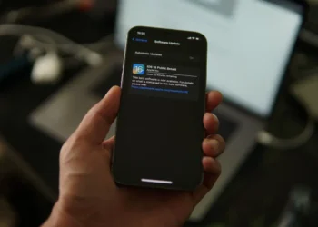 iPhone 12 Pro updating to iOS 16 Beta (Photo by Azamat E on Unsplash)