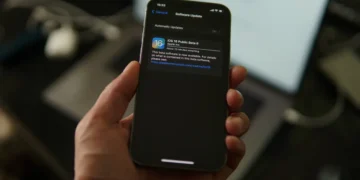 iPhone 12 Pro updating to iOS 16 Beta (Photo by Azamat E on Unsplash)