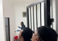 Officers inspecting the scene following the death of an Australian national in the detention room at the Ngurah Rai Immigration Office. (NGURAH RAI IMMIGRATION DOCUMENTATION)