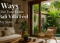 Bali villa style home decor featuring natural wood furniture, rattan chairs, tropical plants, and warm minimalist interior design inspired by Ubud villas.