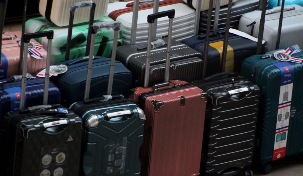 Forgot Your Suitcase Lock Combination? Here's How to Reset It Without Breaking the Lock 40 Suitcases with TSA combination locks at an airport for travelers who forgot their luggage lock combination