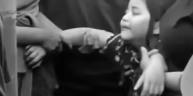 "He Left Behind a Wife and Three Children": The Village Chief Who Fetched a Mob Victim's Body Speaks Out 37 Photo: A first-grade student—the child of an alleged chicken thief who was killed by a mob—weeps over his father's body at the funeral home. (Instagram screenshot)