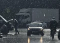 Heavy rain falls over a roadway during severe weather as BMKG issues a heavy rain and strong wind warning across East Nusa Tenggara (NTT), Indonesia.