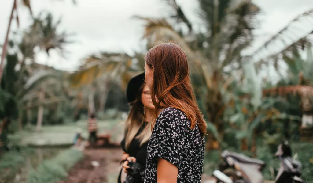 Bali Rules for Tourists: What You Can and Can't Do Before You Visit. 42 Foreign tourists exploring rural Bali while respecting local culture and responsible tourism guidelines.