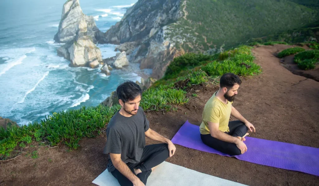 How to Calm Your Racing Mind: A Science-Backed Guide for Bali's Expats and Travelers 38 People practicing mindfulness meditation outdoors to calm a racing mind naturally
