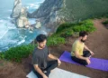 People practicing mindfulness meditation outdoors to calm a racing mind naturally