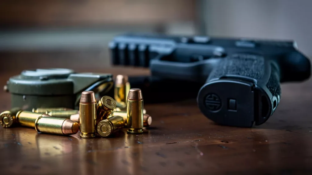 Bali Police Investigate Gun's Origin After Canadian Man Found Dead With Four Live Rounds Still in Magazine 1 Illustration of a handgun and bullets