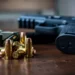 Illustration of a handgun and bullets