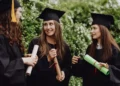 The 10 Most Regretted College Majors, According to a Graduate Survey 50 Illustrative photo of a female university student after graduation.