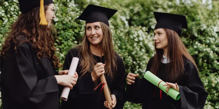 The 10 Most Regretted College Majors, According to a Graduate Survey 37 Illustrative photo of a female university student after graduation.