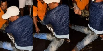 A screenshot from a viral social media video showing a man being subjected to mob justice in Tabanan, Bali.