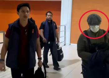 Manhunt Ends: Canggu Bar Shooting Suspect Arrested at Jakarta Airport Less Than 24 Hours After Attack 39 Police escorted the perpetrator of the Canggu shooting from the I Gusti Ngurah Rai Airport Domestic Terminal in Badung, Bali, to the Badung District Police headquarters early Sunday morning. (Photo: Badung District Police)