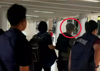 Forensics Now Central to Canggu Bar Shooting Case as Police Question Three Witnesses 40 Police escorted the perpetrator of the Canggu shooting from the Domestic Terminal of I Gusti Ngurah Rai Airport, Badung, Bali, to the Badung District Police headquarters early Sunday morning. Photo: Badung District Police.