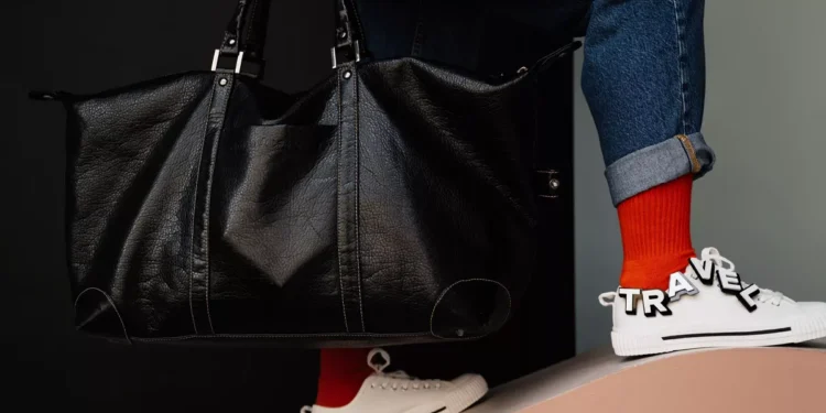 What Shoes Should You Wear in Bali? Sandals, Sneakers or Hiking Boots? 37 Travel bag and casual sneakers packed for a Bali vacation, showing practical travel shoes for island adventures.