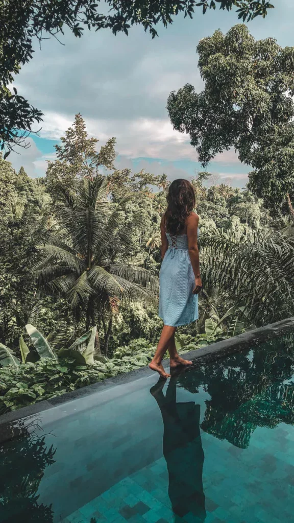 Slow Tourism in Bali: Why More Travelers Are Skipping the Checklist and Staying Put 38 Slow Tourism in Bali enjoying a peaceful jungle retreat surrounded by tropical forest instead of following a rushed sightseeing schedule.