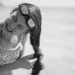 Why Does Salt Water Make Your Hair Feel Sticky? Here's the Science, and What It Means After a Day at a Bali Beach 46 Woman struggling with tangled sticky hair after swimming in the ocean without rinsing off salt water.