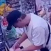Iranian National Arrested for Stealing Cash From Minimarket in Munggu Using Fake Currency-Swap Scam 44 CCTV footage showing an Iranian man allegedly stealing money via a currency exchange ruse at a convenience store in the Munggu area, Badung, Bali. (Photo: Courtesy)