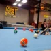 More Than a Game: How Billiards Is Quietly Changing Bali's Social Culture 48 A photo of an American man named Larry playing billiards at Next Shoot Bali (Hey Bali News).