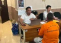 A photo of the Canggu shooting suspect, who is now officially in custody at the Badung District Police.