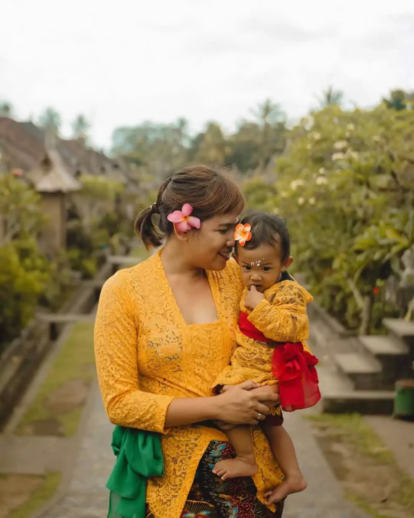 Balinese woman with daughter at village